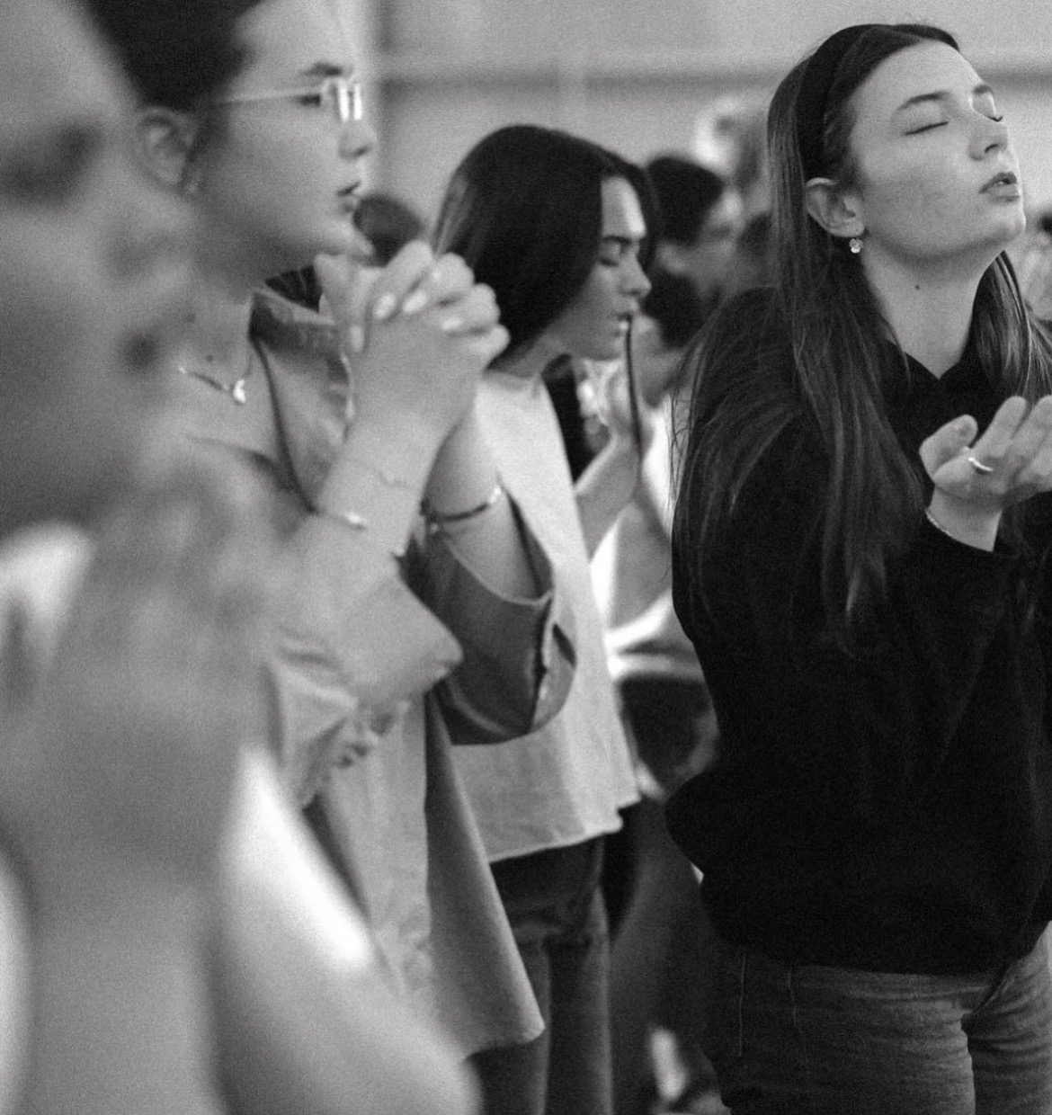 People praying together at a Jesus Place Missouri gathering